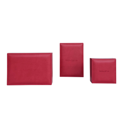 Scatola di moneta rossa di stile d'annata in due pezzi della scatola di cartone del quadrato con interno crema