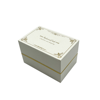 Scatola di Rose Gold Pattern Jewelry Packaging avvolta da carta speciale bianca